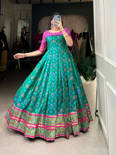 Bottle Green Color Jacquard Silk Patola Print With Zari Weaving Work Gown